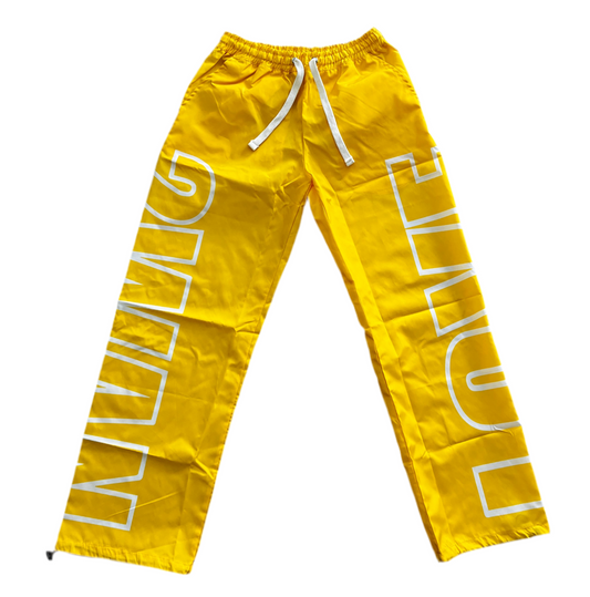 DiVinE mOTioN yellow track pants